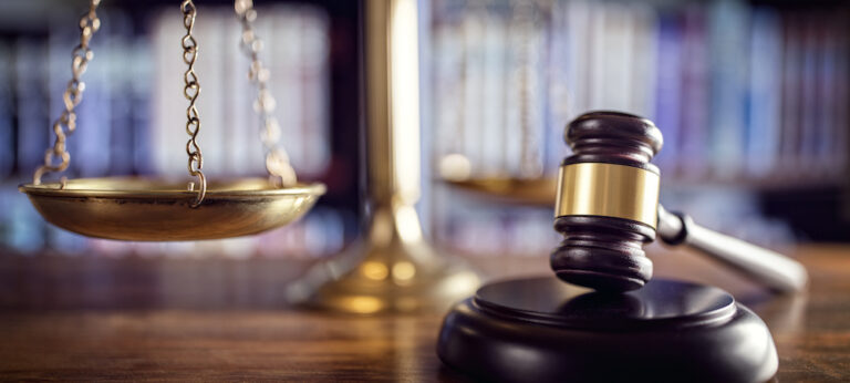 Gavel, scales of justice and law books